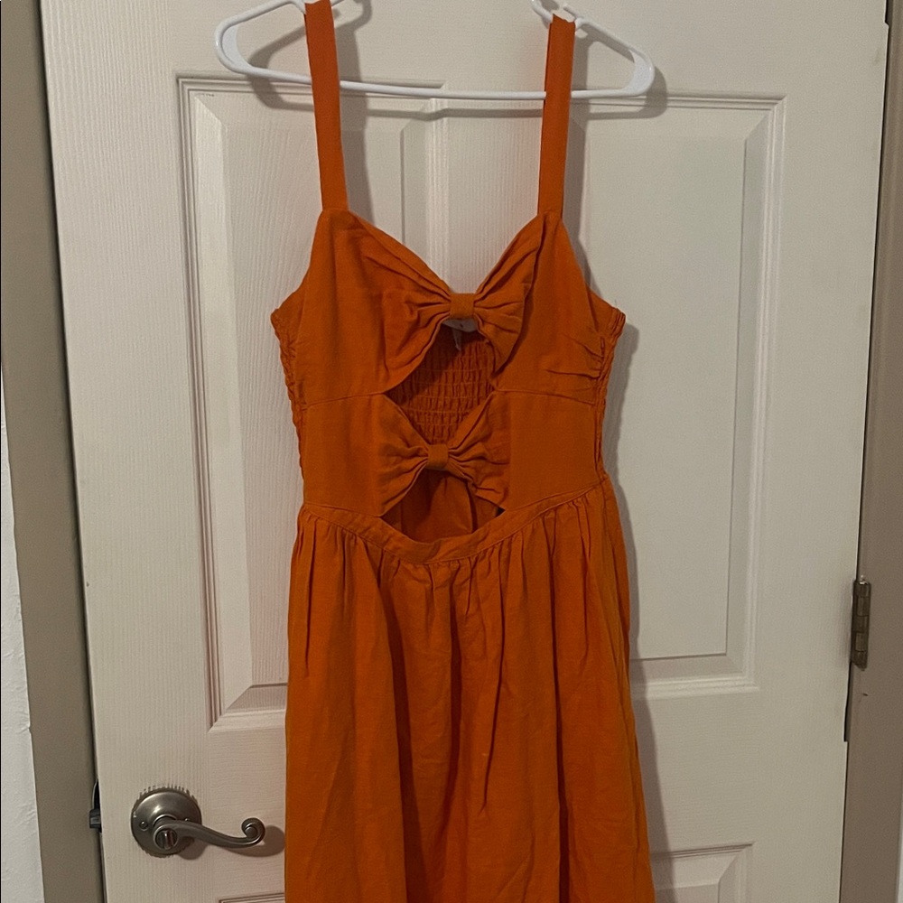 Fe Noel Vibrant Orange Backless Dress with Bow Accents